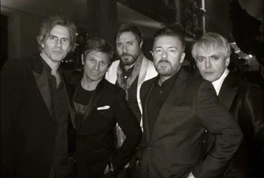 Spandau Ballet, 1979. They became one of the most successful groups to emerge during the New Romantic era. The band's classic line-up features brothers Gary Kemp and Martin Kemp on guitars, vocalist <a href="/rickygervais/">Ricky Gervais</a>, saxophonist Steve Norman, and drummer John Keeble.