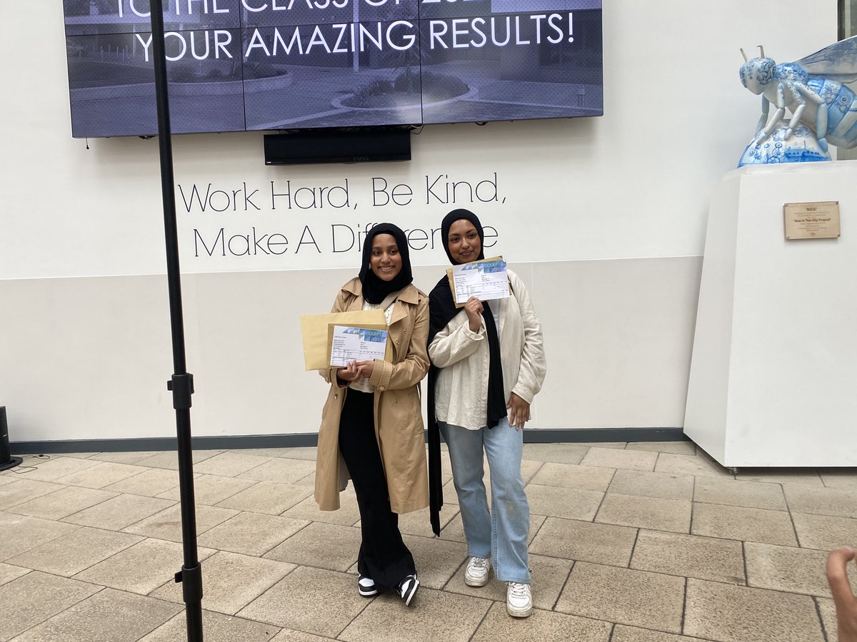Shahana Islam and Farhana Hussain pose for photos with their grades as they celebrate their A Levels together 

<a href="/MENnewsdesk/">Manchester News MEN</a>