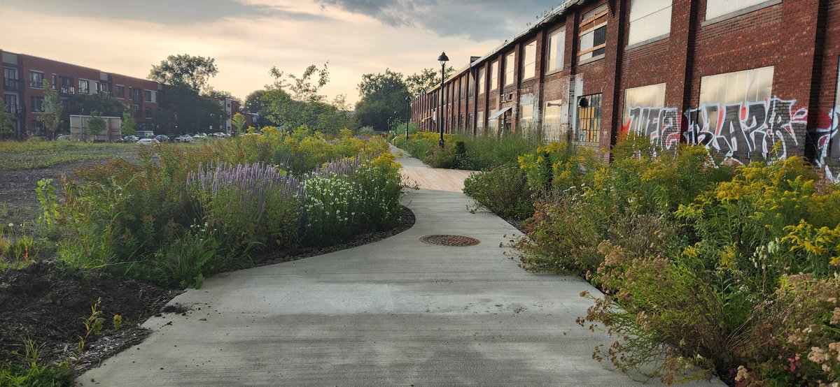 Visit to Batiment 7 - a sustainability seed initiative resulting from 15+ yrs of social mobilization against a large-scale development project. Saw a lot of arts collectives, a small urban farm &amp; a water infiltration (blue green alley) project #pecs3 <a href="/PECS_Project/">PECS</a> @SeedsGA