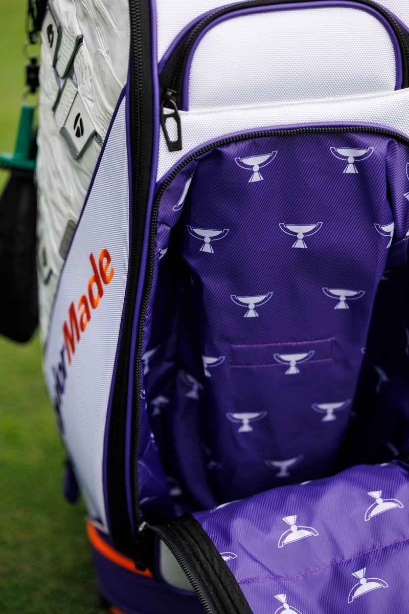 jonathanrwall's tweet photo. Collin Morikawa's employing a @TaylorMadeGolf staff bag in Memphis made from repurposed soon-to-be-recycled FedEx packaging and upcycled materials.

"[Y]ou have recycled gloves on the side, recycled materials. Someone said there's a part of a FedEx truck in it, " Morikawa said. https://t.co/n8WCnJphLX