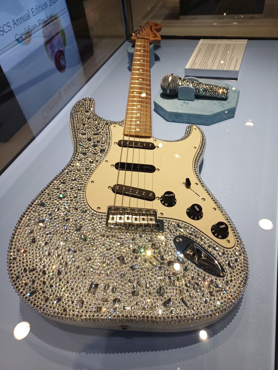 KiteParadeHQ's tweet photo. Finally, a guitar I'm 'allowed' to display on the wall ! Swarovski Fender beauty !! :) https://t.co/KaPyE2oz65