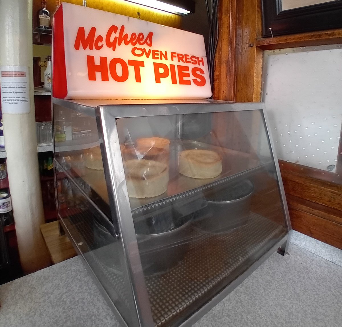 garrypickles's tweet photo. McGees Oven Fresh Hot pies. How many pubs have one of these on the counter.  The Laurieston Bar Glasgow. 👍 https://t.co/31Sm3DcUve