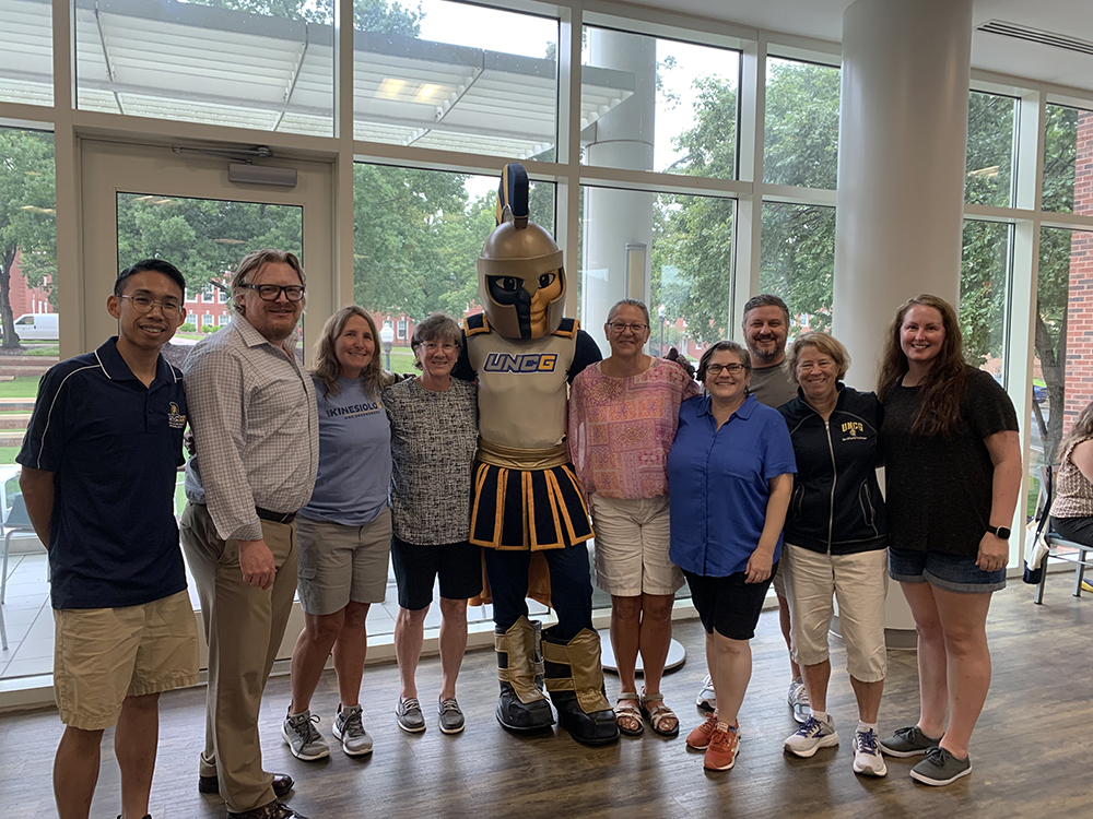 uncghhs's tweet photo. Spiro and the @UNCGKin Department are ready to welcome students, staff, and faculty back to @UNCG! We're ready for a great fall semester. #back2uncg ๐ ๐ป https://t.co/ZbWJTdRs3A