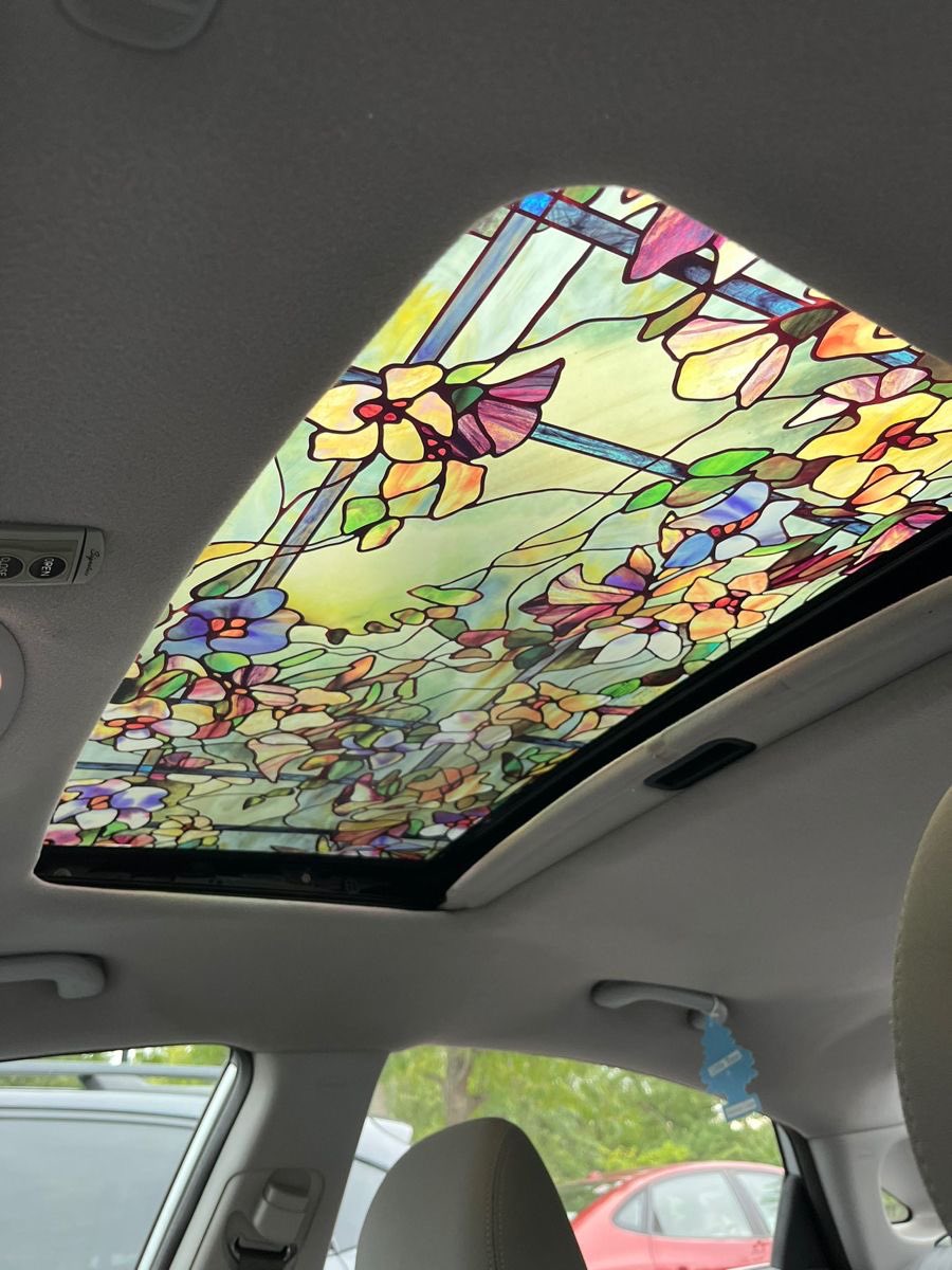 300moods's tweet photo. stained glass car sunroof https://t.co/6LTiPv6SdP