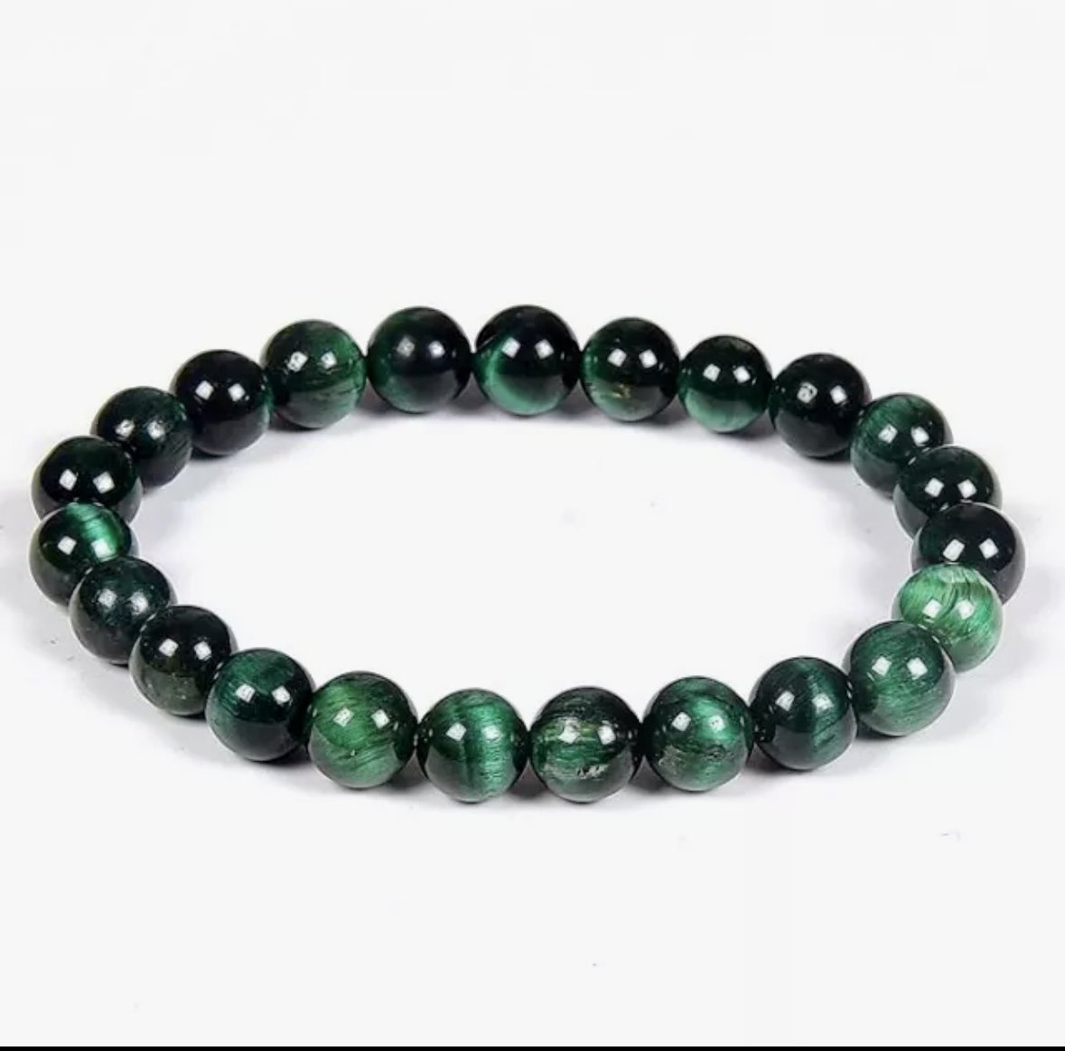 MoonChild_W333's tweet photo. #CrystalShowAndTell today is
#GreenTigersEye it's extremely rare to find it in nature it's usually dyed this is the real deal my friends with a gemologist certification tip if u have one scratch it if it leaves a stain it's fake @Cosmic_Mystery@ @aaronmread
@SnowInTheAir @MrH1987 https://t.co/DhHhJDdxMh