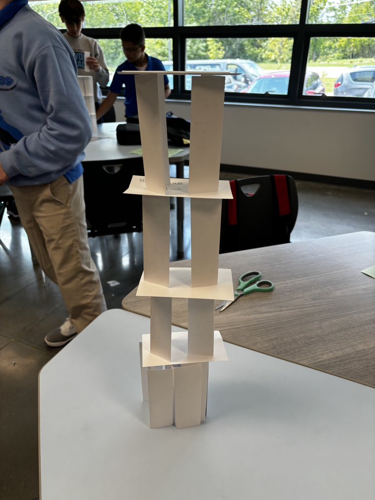 KatieAllenAIC's tweet photo. 7th graders in Ms. Downey’s class are working to build community. They found commonalities with teammates & worked as #ProductiveCollaborators & #EffectiveCommunicators to strategize and build towers using cards with their commonalities & a pair of scissors! https://t.co/wrwUnszPzg