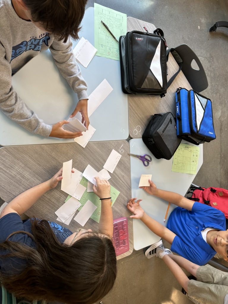 KatieAllenAIC's tweet photo. 7th graders in Ms. Downey’s class are working to build community. They found commonalities with teammates & worked as #ProductiveCollaborators & #EffectiveCommunicators to strategize and build towers using cards with their commonalities & a pair of scissors! https://t.co/wrwUnszPzg