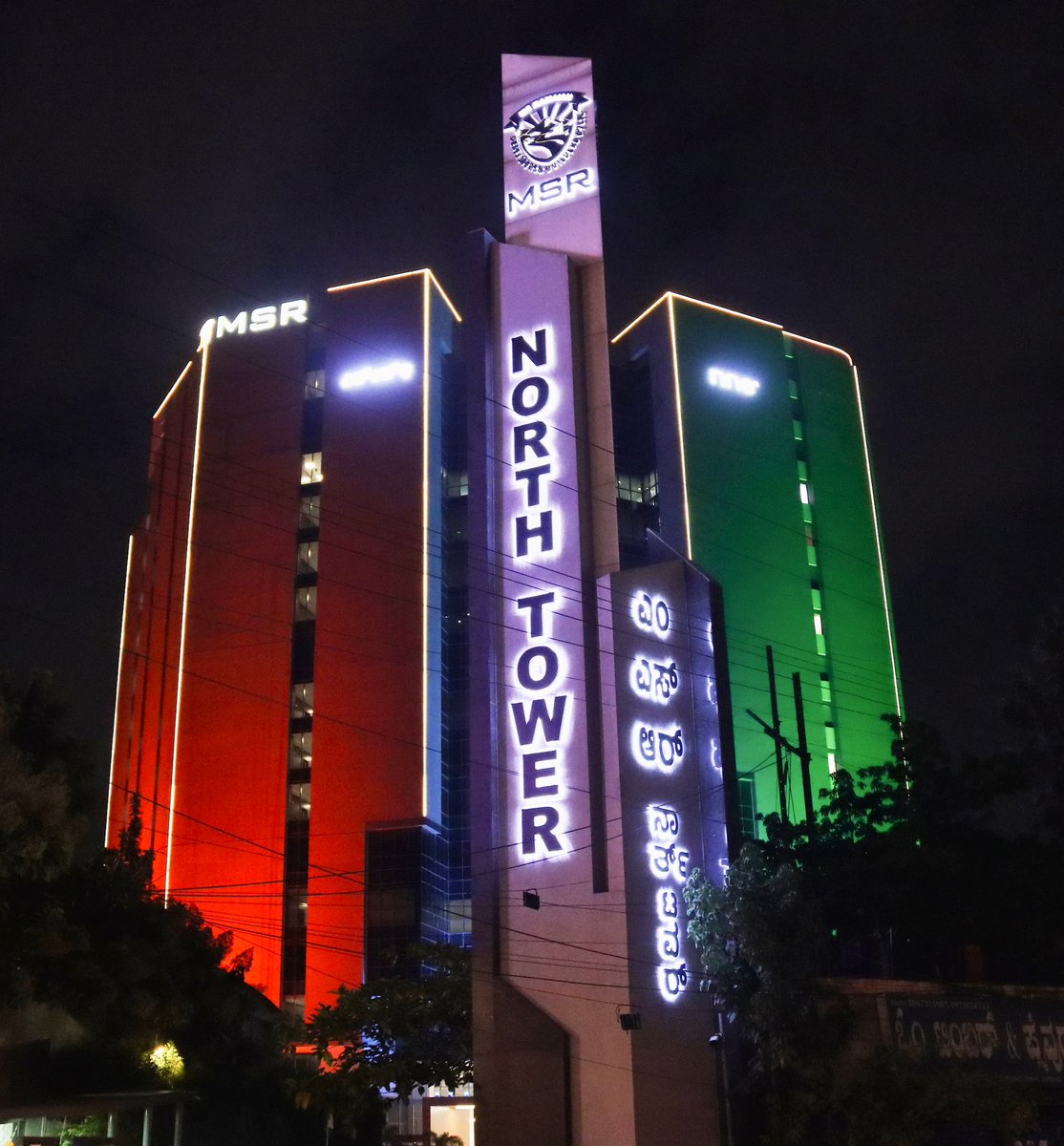 RakshaRamaiah's tweet photo. On the occasion of the 78th Indian Independence Day, the MSR North Tower proudly shines in saffron, white, and green! 

Let’s honor our nation's spirit by turning patriotism into action, leading with infrastructural development to ensure progress reaches every corner of India. 

Jai Hind! 🇮🇳 

#IndependenceDay #India78 #Msr #MSRamaiah #Bengaluru #India❤️ 

https://t.co/NKnBZDtvOX