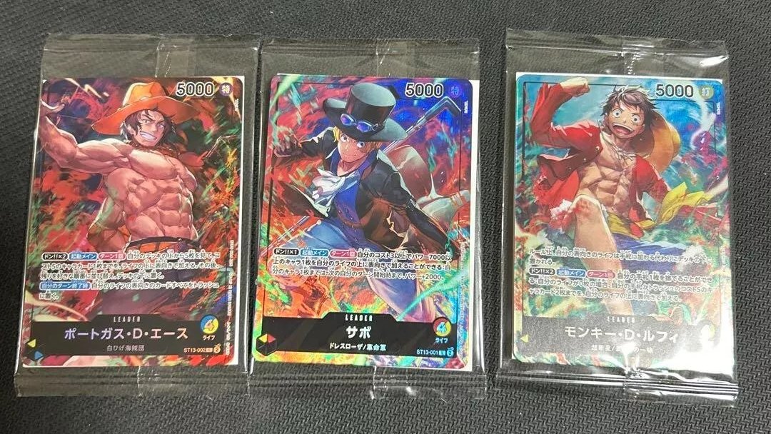 In-person shot of the new OPTCG 7-11 Promo Ace, Sabo, & Luffy