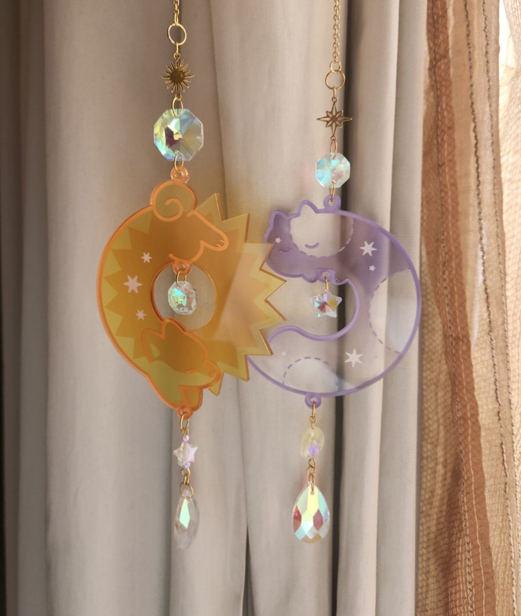 shirokumani's tweet photo. so i made a sun dog and moon cat sun catchers.... https://t.co/NZG2d0XlOU