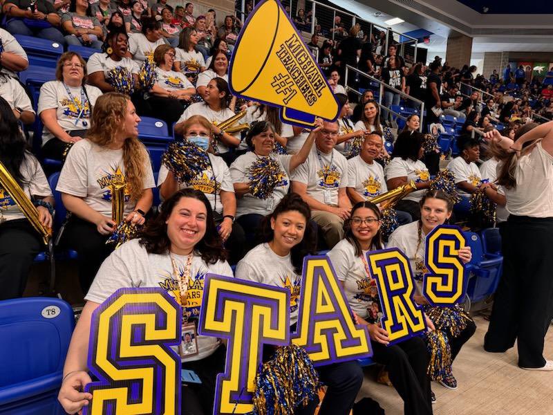 NISDMichael's tweet photo. @NISDMichael staff showing of our school spirit at this year’s convocation. #25yrsshinning #starspirit https://t.co/VbdbPOFnik