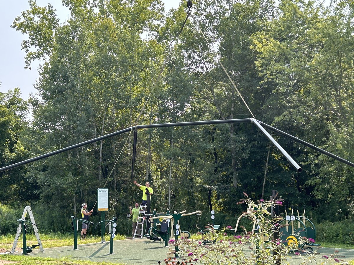 Crews work to install the steel frame that will support a shade canopy over newly installed fitness equipment at Ellington’s senior center.  The project was funded through a grant from the State of CT. (Thank you <a href="/jfoster_rd/">Jaime Foster, PhD, RD</a>)