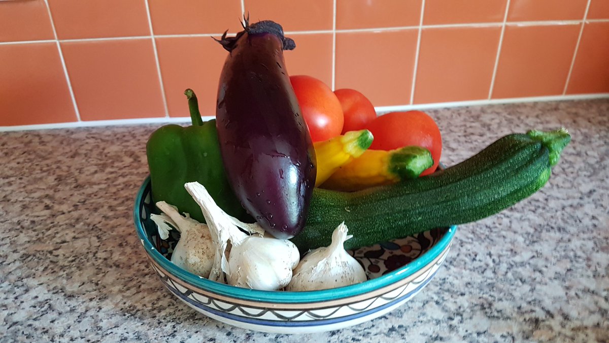 theliterarypig's tweet photo. Can you guess what I'm making for lunch? The only ingredient not home grown are the red onions (all my onions failed dismally this year). Ratatouille with a halloumi topping. Yum 😋 #Veggies #VegGarden #AmEating https://t.co/jBXYSzGYqS