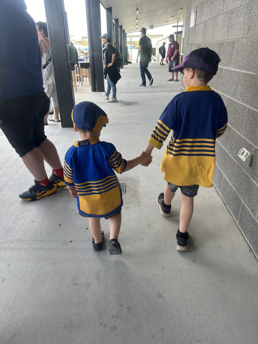 pethyy11's tweet photo. Loved taking my boys to a Parra game in the daylight on Sunday. Each wearing some of my old 80’s gear 💙💛 #NRLW https://t.co/sNlW8RZrrH