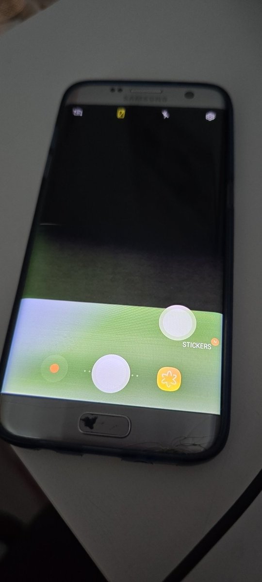 Axolox_'s tweet image. I got a new phone and here's my old galaxy s7 edge, picture taken with my new phone. Can you guess what phone I just got?