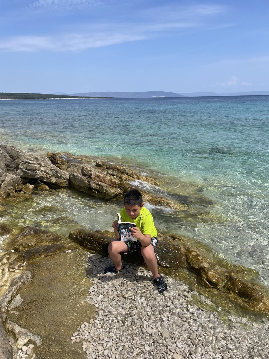 Lidorilils's tweet photo. @SandwichJunior Noah reading somewhere beautiful 😍 #readingchallenge #croatia https://t.co/QscbhLjp1O
