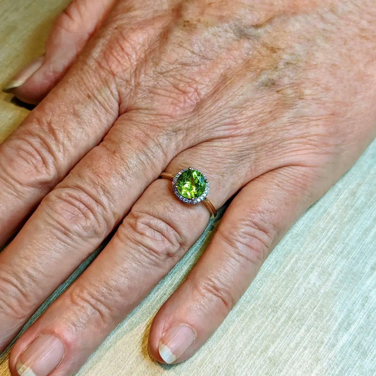 There are several green gemstones, but if you're born in August, your birthstone is the alluring green Peridot.

This beautiful ring, crafted from 9ct yellow Gold, is set with a 2.03ct round Peridot &amp; surrounded by a halo of 0.10ct of sparkling 💎 .

#peridot #sbs #firsttmaster