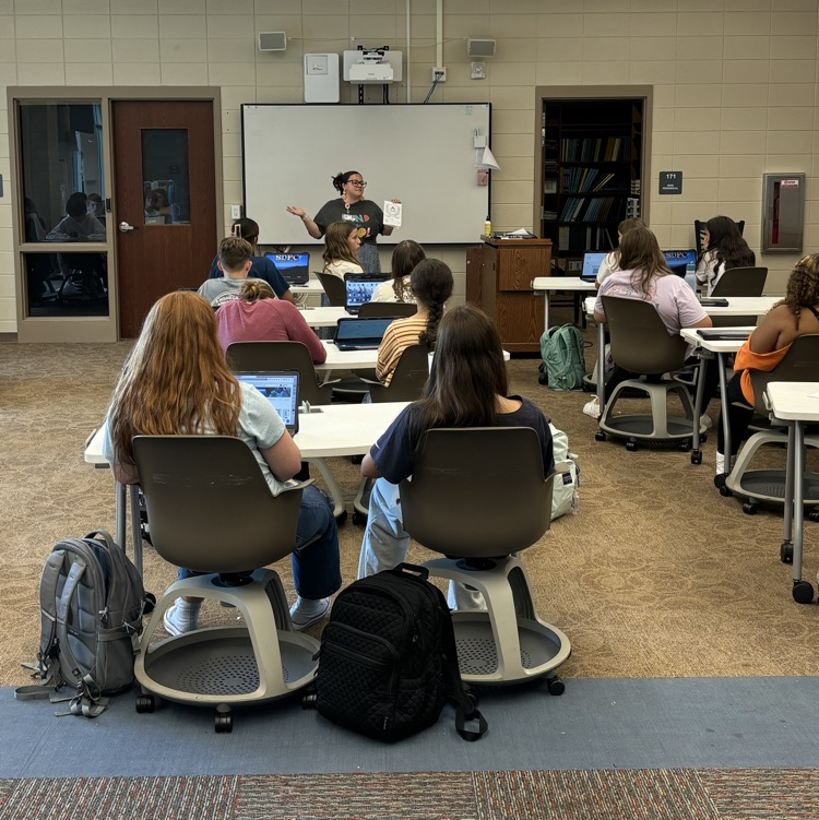 DWDanielHigh's tweet photo. Grounds crew giving DWD a fresh cut, orientation in the library learning commons, and class of 25 leaving their legacy with handprints on senior flag. #day010 #oneDANIEL https://t.co/jw3CpjDmLu
