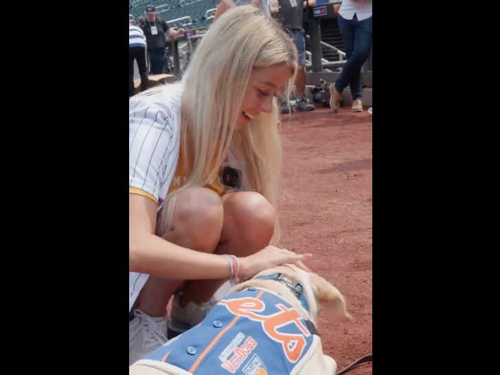 barstoolsports's tweet photo. While The Internet Was Crying About Hawk Tuah Girl Throwing The First Pitch At A Mets Game, She Was Just Trying To Raise Money For Veteran Dogs https://t.co/JpUKGCfOV6 https://t.co/vKb4omqES4