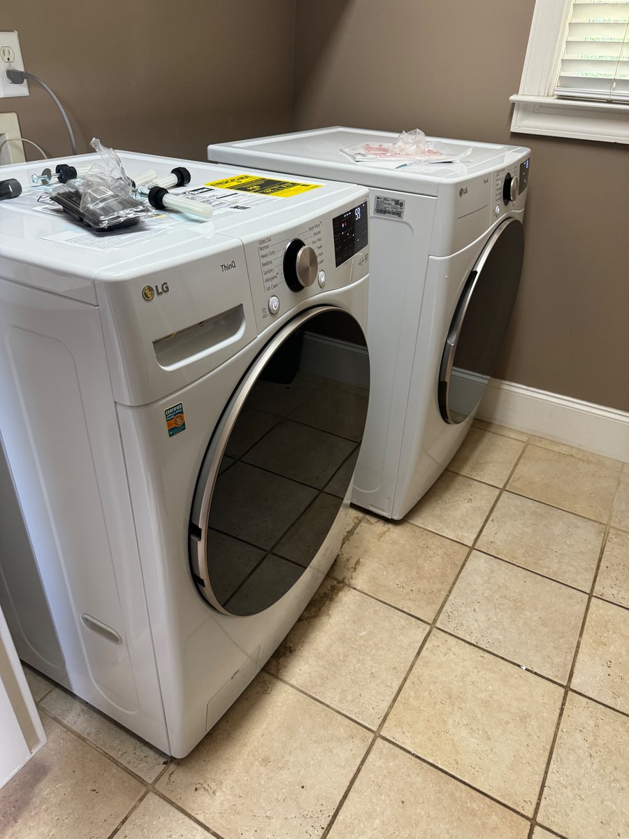 1rudebro's tweet photo. Absolute crappy experience purchasing a washer/dryer from @LGUS. Didn't honor their offer. Out of stock on matching pedestals. Bought them elsewhere. Told by LG and installer they would install them. They didn't. No chance to clean space, no explanation of units. Left like this. https://t.co/DCttOMyj3m