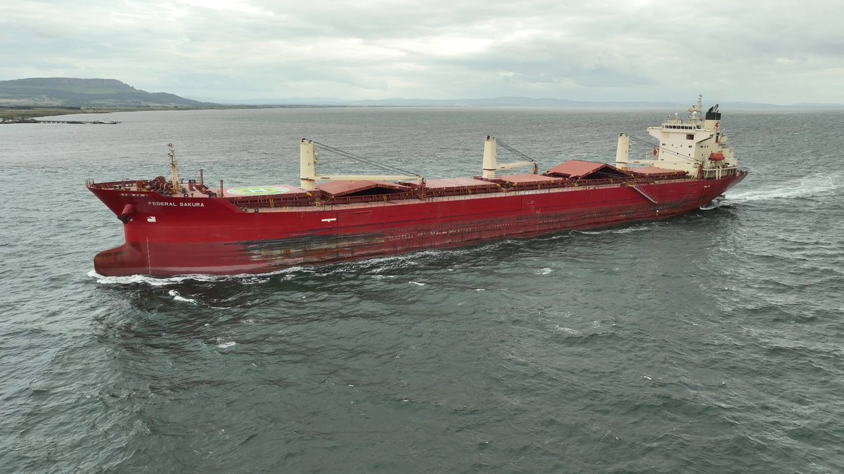 martinastro2005's tweet photo. Federal Sakura sailing outbound from Lough Foyle late this afternoon at 190m in length with a flag from the Marshall Islands. I was flying the Magic 3 in 29mph gusts with a mean wind of 23-25mph today and the drone didn't flinch even in P mode. #foyleport @fednavlimited https://t.co/m5eaStwcP9