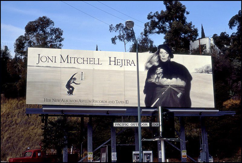 Joni Mitchell, Hejira Billboard (1976) by Robert Landau.