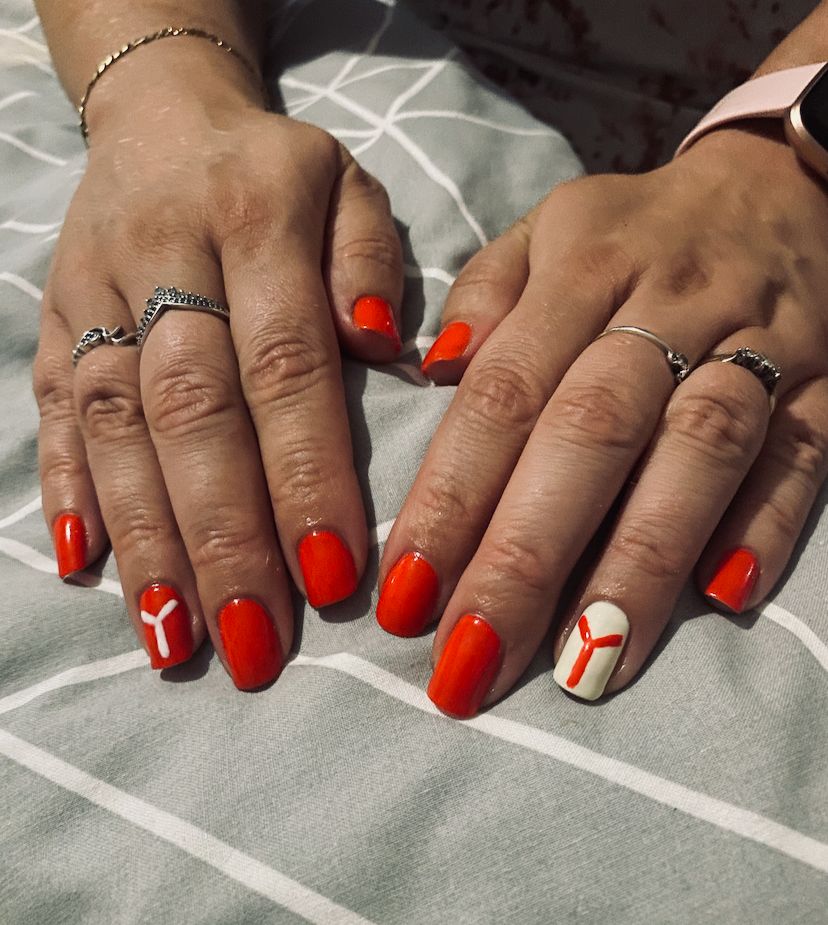 Nails all ready for the first home game! (First attempt 😅) #ycfc❤️💙