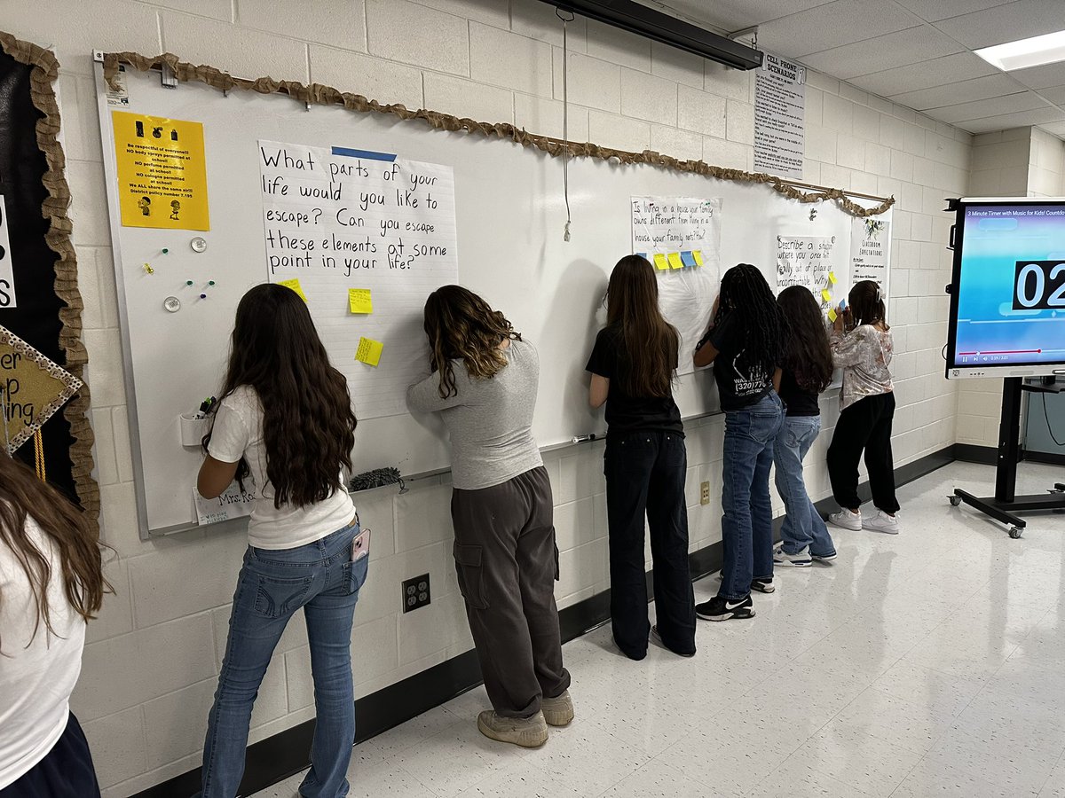 Answering pre-reading questions around the room for our first short story of the year: The House on Mango Street. #ELA #8thgrade #collaboration