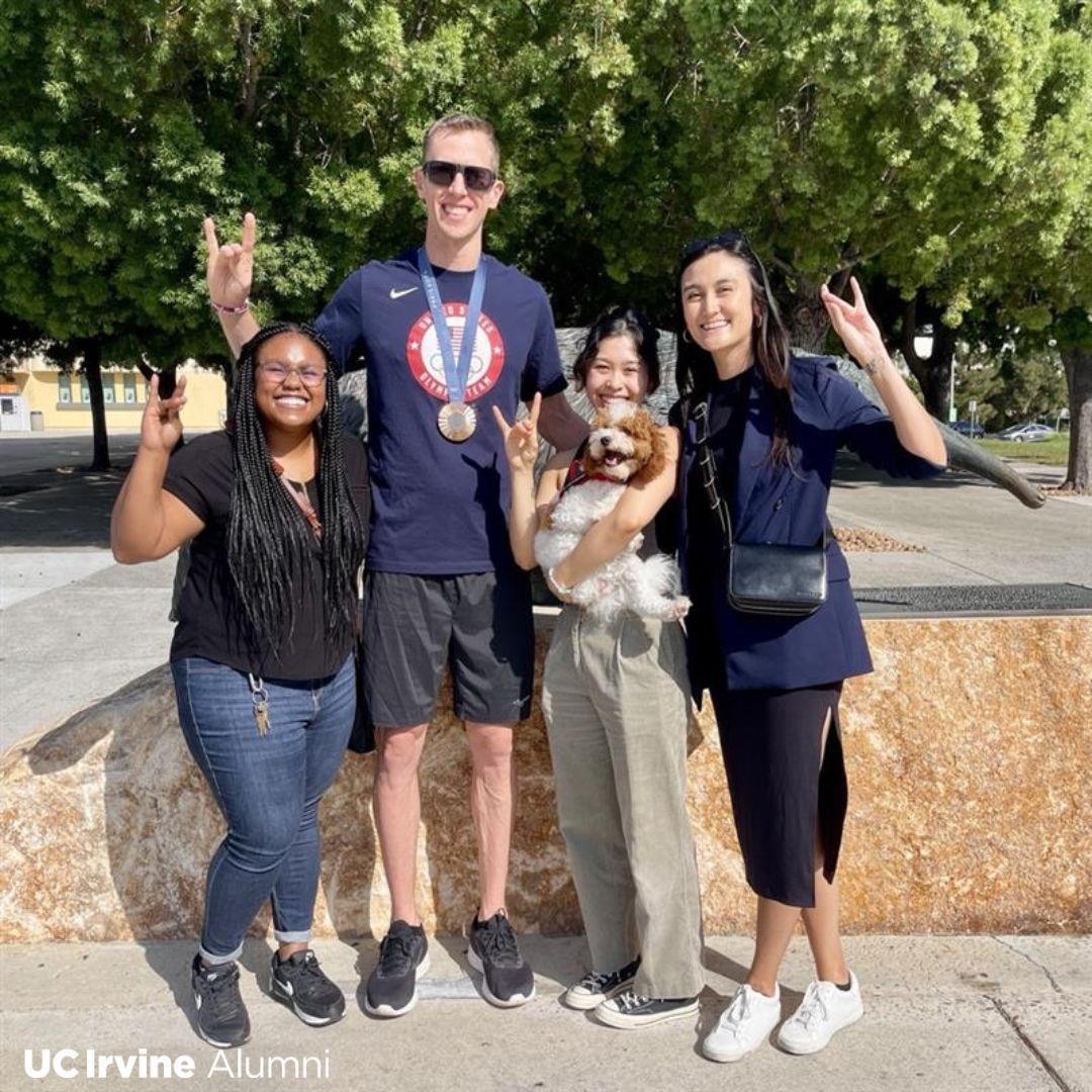 UCIAA's tweet photo. 🇺🇸 🏐@usavolleyball 🏅Olympic Bronze Medalist David Smith '08, shared #Zots w/some of the UC Irvine Alumni Association team @UCIrvine @brencenter during his visit with @ucimvb @UCIAthletics to catch the @Saints 🏉 practice! 💙 💛#UCIPride #UCIAlumni https://t.co/3o1x0hpO9V