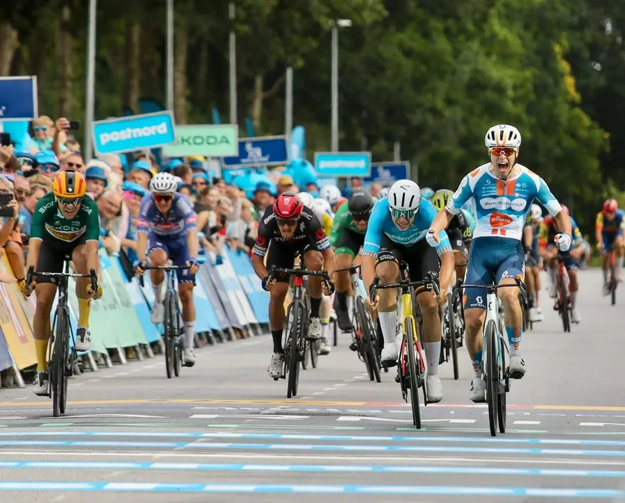 CyclingGazette's tweet photo. Tobias Lund Andresen Edges to Stage 3 Victory at the 2024 Postnord Danmark Rundt  

https://t.co/oMnD1Gc1W8… 

#postnorddanmarkrundt2024 #danmarkrundt2024 #tobiaslundandresen #dsmfirmenichpostnl #denmark #danmark #uci #peloton #cycling https://t.co/J71hZeYrFh