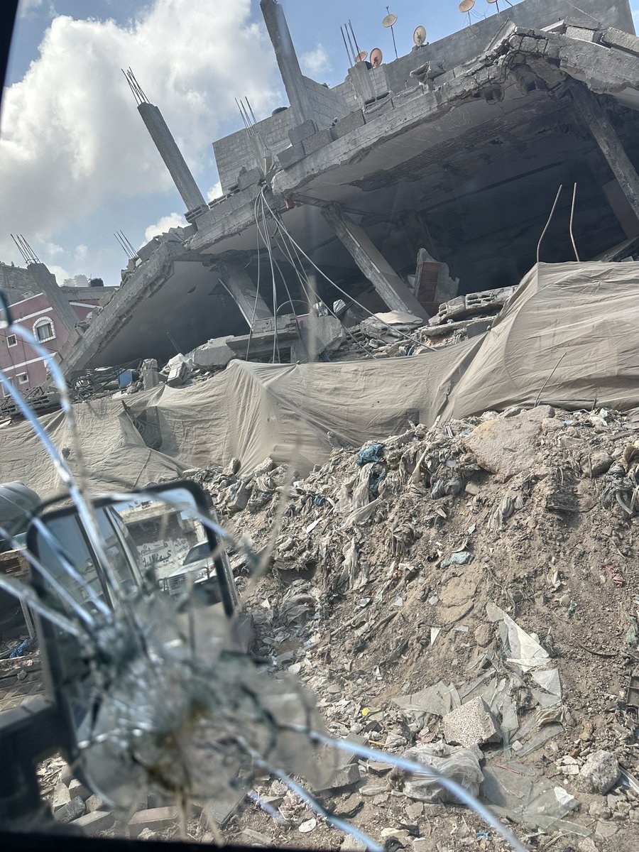 UNWateridge's tweet photo. #Gaza Once again new evacuation orders: many of the thousands of families affected only recently arrived in the area, after other displacement orders in Khan Younis

Through shattered windows, nothing but shattered homes &amp; shattered lives. People trapped in this endless nightmare https://t.co/6781lBCJQD