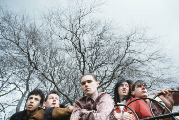 sosallycinnamon's tweet photo. The Stone Roses, with Andy Couzens and Pete Garner, 15th March, 1985 (WHAT is John wearing on his head) https://t.co/iQZKkdCZkQ
