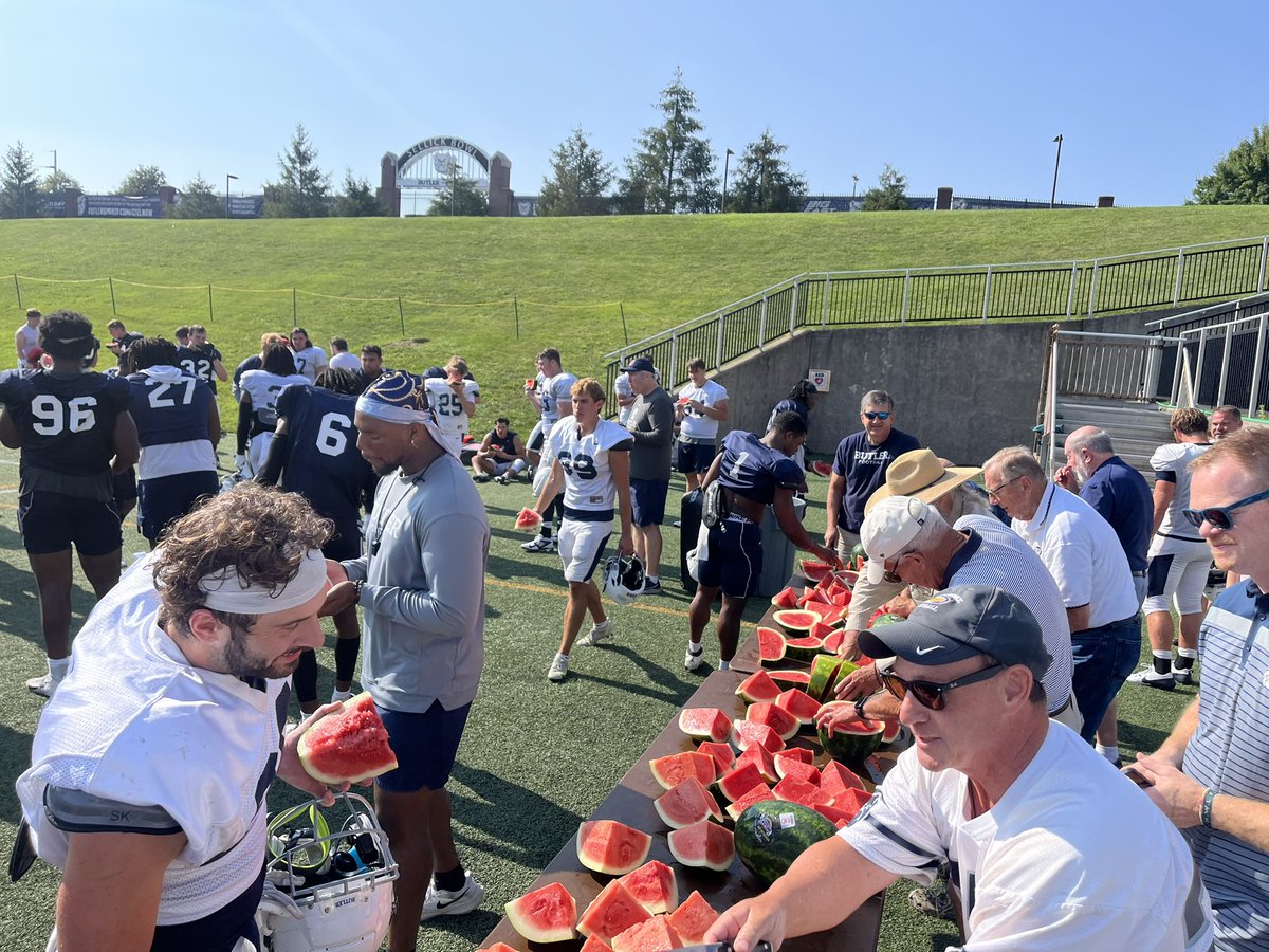 CoachU_BSU's tweet photo. Thank you to @ButlerUFootball legend @KLaRoseBU and the football alumni for the annual post scrimmage watermelon. Great to have the them back on campus. #TheButlerWay https://t.co/sJ9IG8HXB8