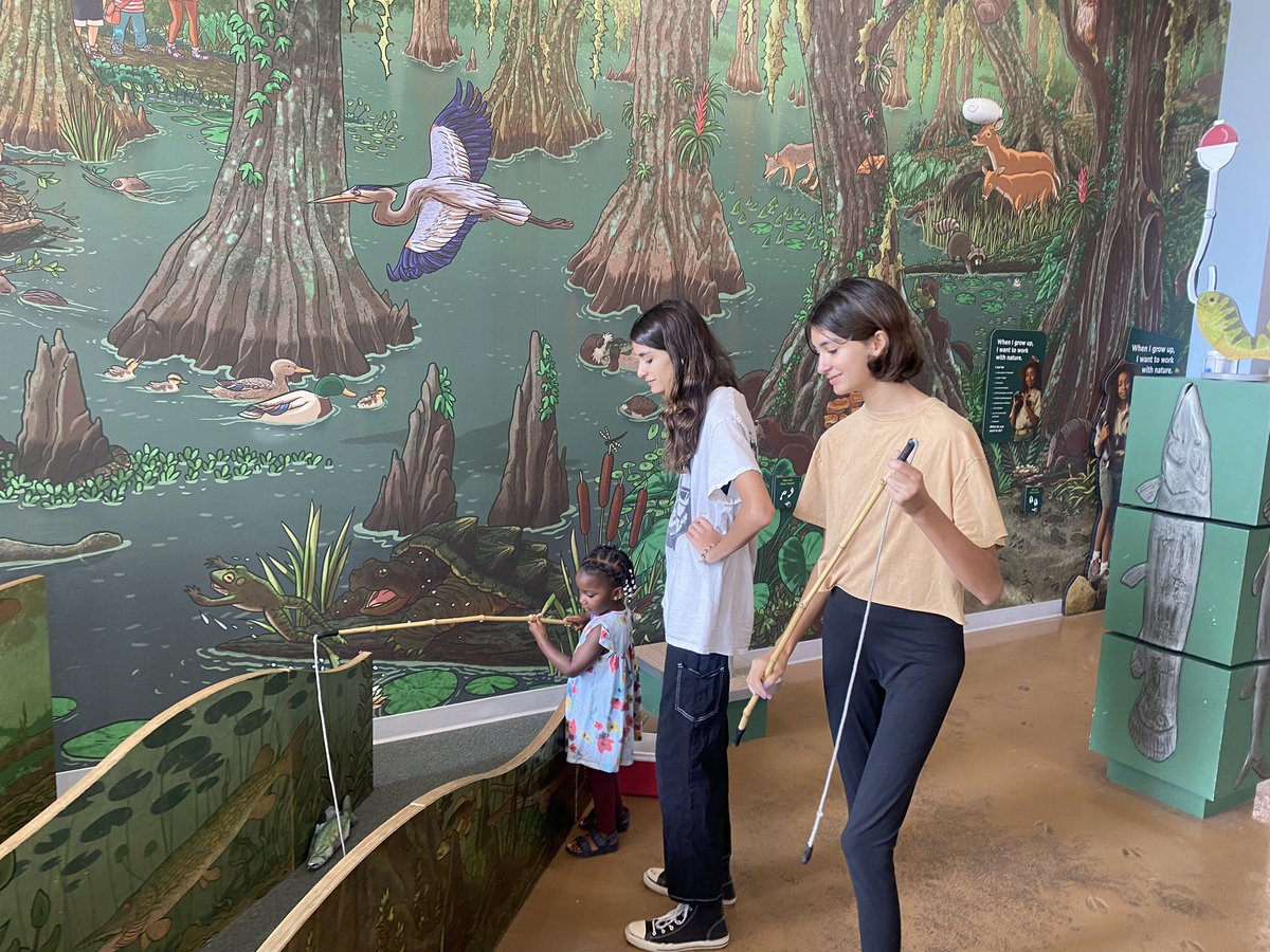 PREAUX_FISH's tweet photo. Big kids bringing the little kid to the kids museum they loved when the big kids were little kids. 

Also did this gar eat a bird?  🐟 🦆 @KnockKnockCM https://t.co/fG3hJqj0rB