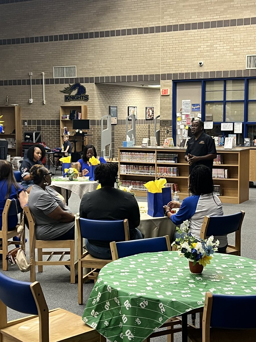 EHS_Knightswire's tweet photo. What a fun morning learning about @ElkinsFootball with our EHS football moms at Helmets and Heels.  Fashion show of new uniforms, q&amp;a with players and officials, shopping, and lessons from @CoachTGr @Coach_CT3 and @CoachThornton93, and @JuneToml. 💙🏈💛 #KnightLife https://t.co/ybmptETh7H