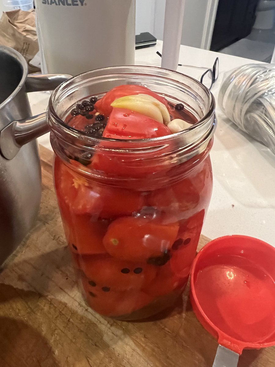 EliMcCann's tweet photo. Canning pickled tomatoes today. And don't you dare knock it if you haven't tried it. Don't make reply to my own tweet with The Image. https://t.co/HQACoyIWHO