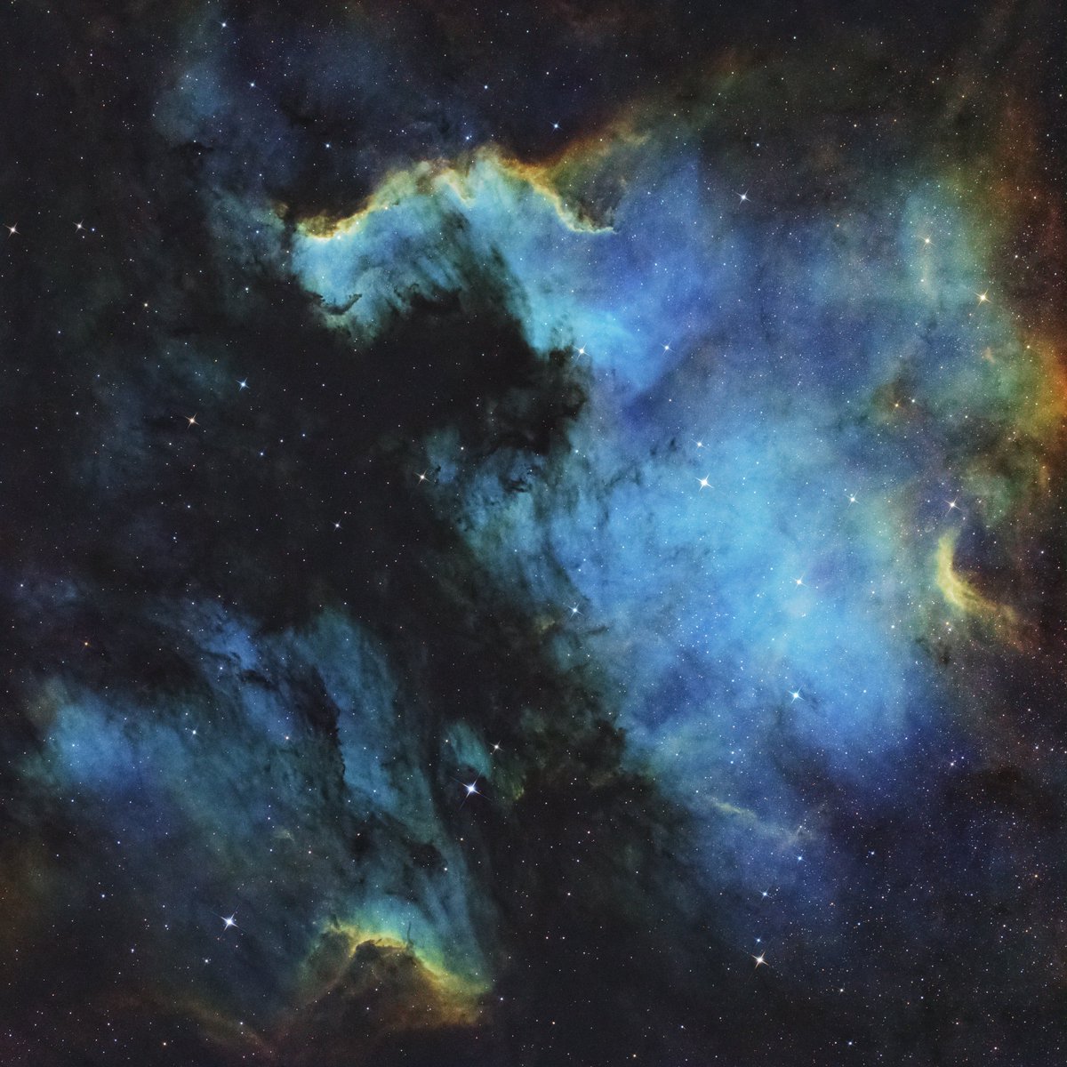 ObservatoryM42's tweet photo. The North America &amp; Pelican Nebula. My first image shot in true SHO. 

2hrs Ha/Oiii
2hrs Sii/Oiii
20mins L for stars

ASI533MC Pro, Redcat 51, Altair 4nm Dual-Band Filters AM5, PHD2 Guiding. Shot from Bortle 9 and Processed in Pixinsight

#Astrophotography https://t.co/klkLgt277E