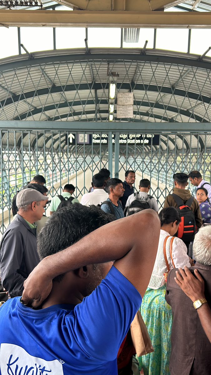 MeetjeevanJ's tweet photo. @OfficialBMRCL The gates not opened towards metro entry at majestic railway station entry.commuters are waiting for long . Are the timings changed . Now current time is 6:40am on 18th Aug 2024. Please pass on prior information would be appreciated atleast a notice about timings. https://t.co/QS42K5k63y