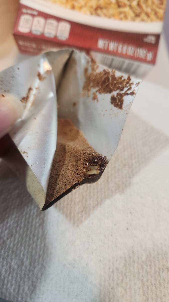 AlexandraMaeW's tweet photo. @RiceARoniUS 
What happened maaan... opened my 2 boxes of beef rice-a-roni and the powder was black and the rice came in big black clumps...
I just wanted dinner😭😭 https://t.co/WW4Bn5nfAe