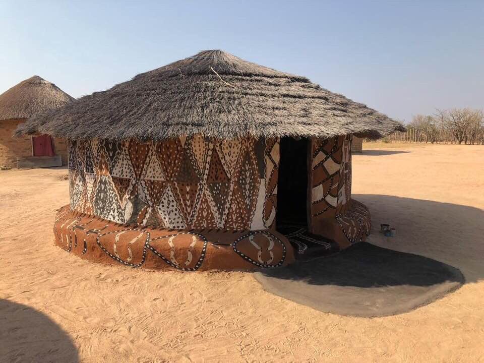The women of Matobo, Zimbabwe paint their dwellings with intricate designs using charcoal, ash, water and soil, an annual ritual with continually changing imagery #womensart
