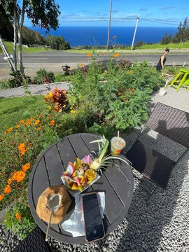 Come watch the volcano with coconut water and fruit platter