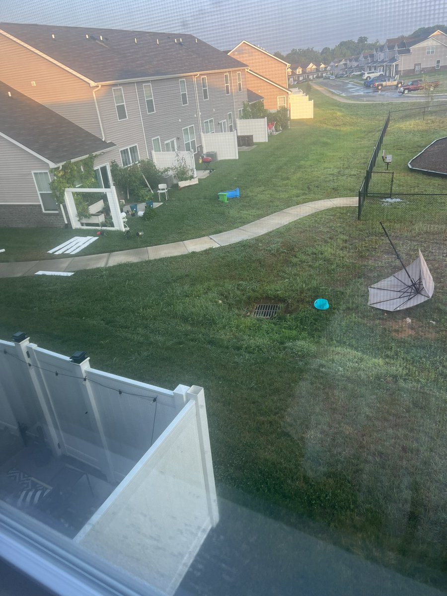 sherryleevale's tweet photo. @NashSevereWx Neighbors fence blown down and someone’s umbrella here in Spring Hill #tspotter  crazy loud storm! https://t.co/S4P3Fw0k8t