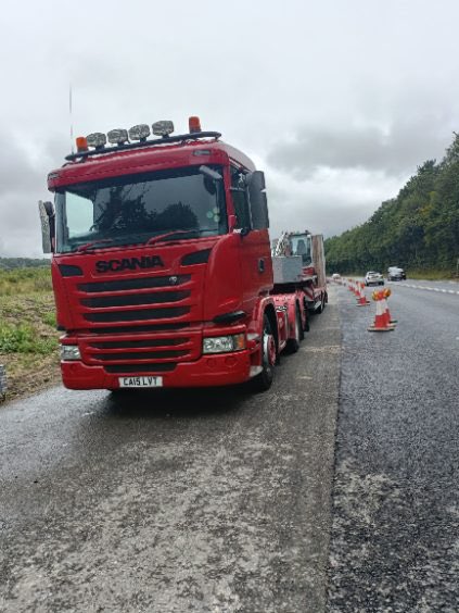 Gildertransport's tweet photo. One of our specialist low-loader vehicles hard @ work this week working in the road works down in Devon @ night #highwaysEngland #Trafficmanagement #roadworks #lowloaderhire https://t.co/FqpKTbx6xS