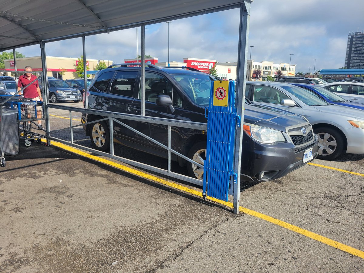 eilujseifert's tweet photo. Riddle me this
Walmart putting gates on cart corrals to lock up at night #HamOnt https://t.co/loXYHHt2Ge