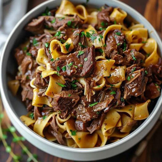 summer_food's tweet photo. Crockpot Mississippi Beef and Noodles:

Ingredients:

- 2 pounds beef chuck roast, trimmed and cut into chunks
- 1 packet (1 ounce) ranch seasoning mix
- 1 packet (1 ounce) au jus gravy mix
- 1/2 cup unsalted butter, sliced
- 8-ounce jar pepperoncini peppers, with juice
- 8 ounces wide egg noodles
- 1/4 cup chopped fresh parsley, for garnish
- Optional: additional pepperoncini peppers for serving

Instructions:

1. Prepare the Beef:
- Place the beef chuck roast chunks into the bottom of your slow cooker.

2. Add Seasonings:
- Sprinkle the ranch seasoning mix and au jus gravy mix over the beef.

3. Add Butter and Peppers:
- Place the slices of butter on top of the beef.
- Pour the entire jar of pepperoncini peppers (including the juice) over the beef and butter.

4. Cook:
- Cover and cook on low for 7-8 hours, or until the beef is tender and shreds easily with a fork.

5. Prepare the Noodles:
- About 30 minutes before serving, cook the egg noodles according to package instructions. Drain and set aside.

6. Combine Beef and Noodles:
- Once the beef is cooked, shred it in the slow cooker using two forks, mixing it with the juices and peppers.
- Stir in the cooked egg noodles until well combined.

7. Garnish and Serve:
- Transfer the beef and noodles to a serving dish or keep in the slow cooker on the warm setting.
- Garnish with chopped fresh parsley.
- Optional: Serve with additional pepperoncini peppers on the side if desired.

Enjoy your flavorful and hearty meal!