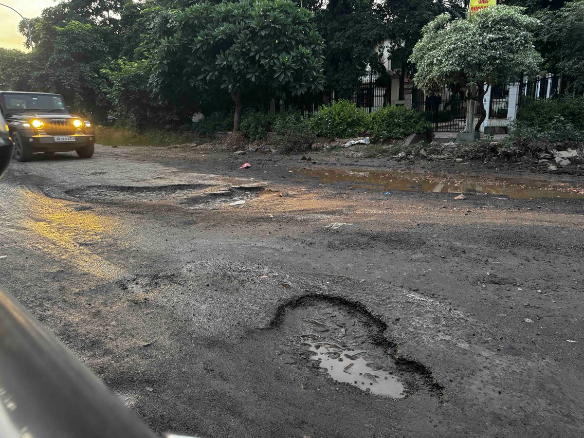 010797- the potholes on the roads are big enough to swallow cars completely &amp; yet every official is blind 
<a href="/MunCorpGurugram/">MCG</a>
<a href="/cmohry/">CMO Haryana</a>
<a href="/Rao_InderjitS/">Rao Inderjit Singh</a>
<a href="/narendramodi/">Narendra Modi</a> <a href="/NayabSainiBJP/">Nayab Saini</a> <a href="/diprogurugram1/">DIPRO Gurugram</a> 
is the government waiting for some accident to happen before something is done. shame !
