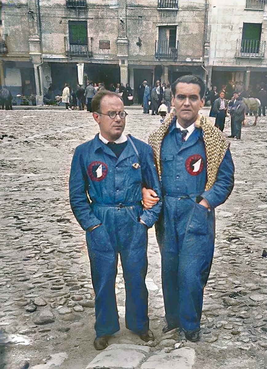 Almazán (Soria). Julio 1932. The spanish poet Federico Garcia Lorca (1898 -1936) with the uniform of Theatre Group La  Barraca with the co-founder and director Eduardo Ugarte.