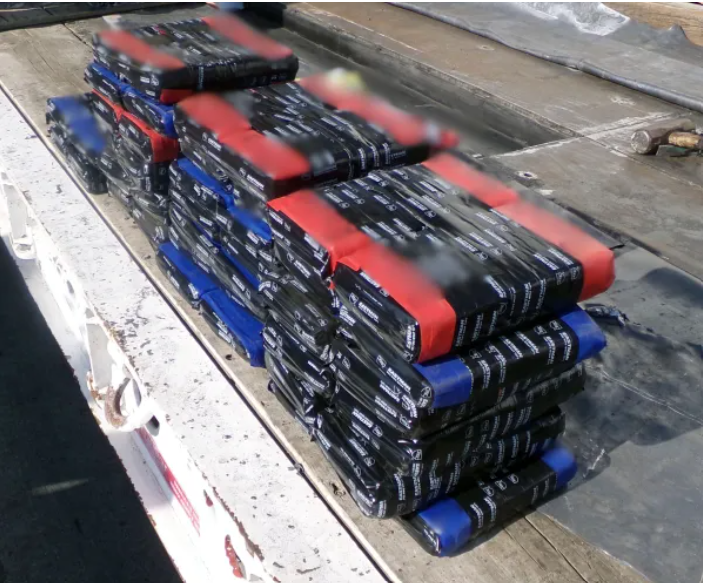 CBP's tweet photo. Last week CBP officers in California seized a total of 77 packages of cocaine and 50 packages of fentanyl powder. 370lbs of narcotics were extracted from a hidden compartment inside a flatbed trailer. #FrontlineAgainstFentanyl #OperationApollo
Read more: https://t.co/PI00Ux0ivi https://t.co/4qGuQzNmD6