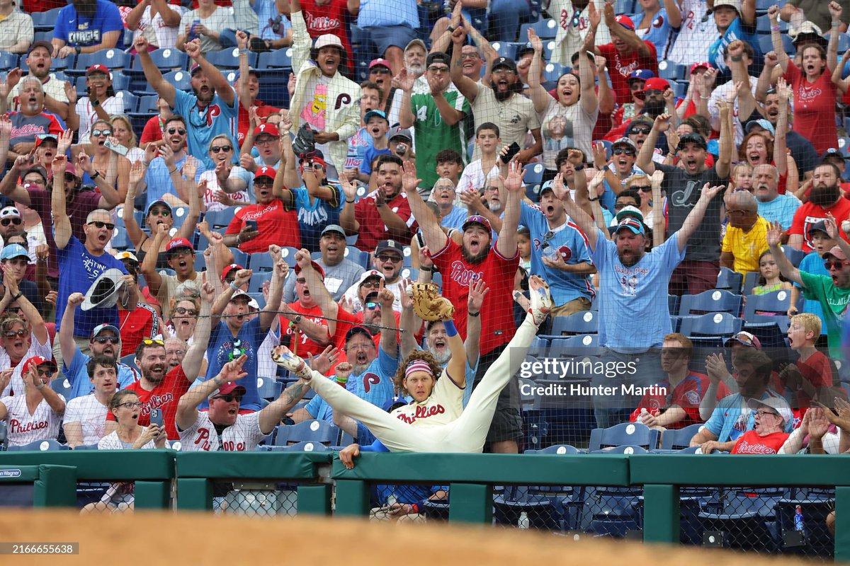 Alec Bohm of the #Philadelphia #Phillies catches a foul ball as he falls back into the stands in the ninth inning during a game against the Washington Nationals. The Nationals won 6-4.  📸: Hunter Martin #mlb