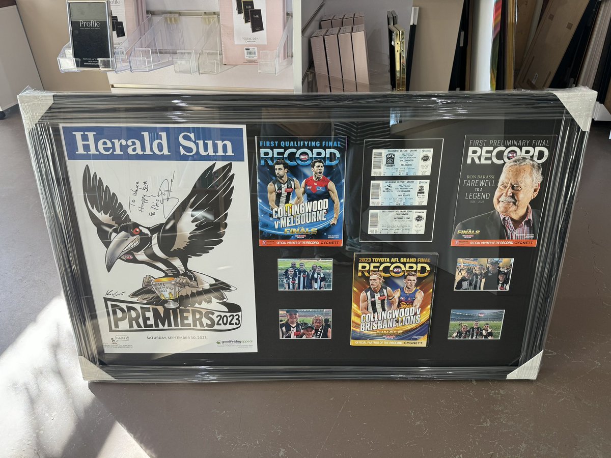 Belly035's tweet photo. Finally got my @CollingwoodFC 2023 WEG framed. Thanks to my 12yo for getting it autographed. I absolutely love it 

#sidebyside https://t.co/9chfYXreku
